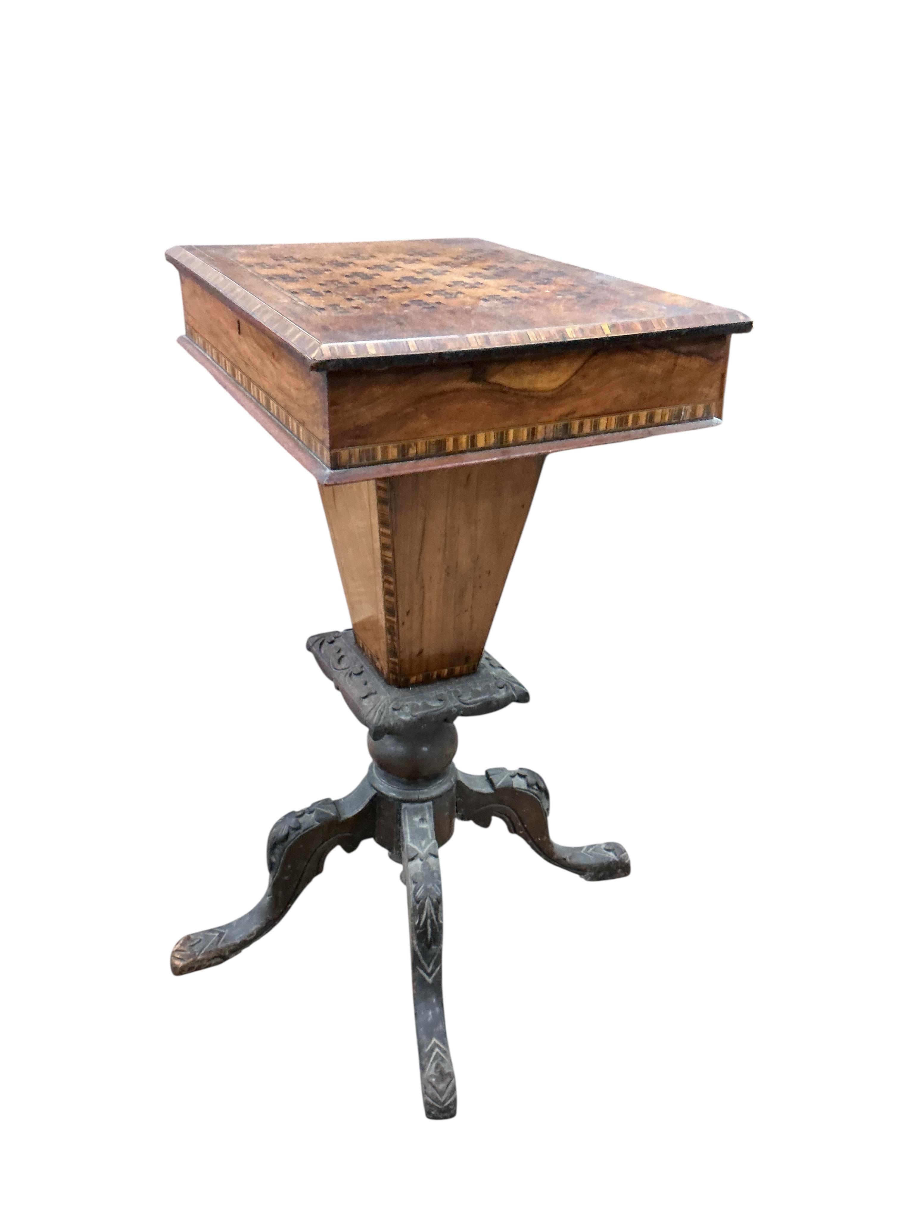 A Victorian parquetry inlaid walnut games/work table, width 48cm, depth 35cm, height 78cm.